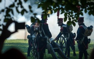 18th century soldier load a canon